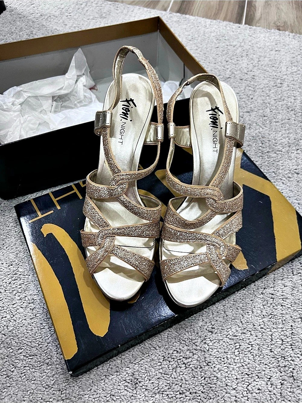 Title:
Fioni Night Gold Glitter Strappy Platform Heels Size 9